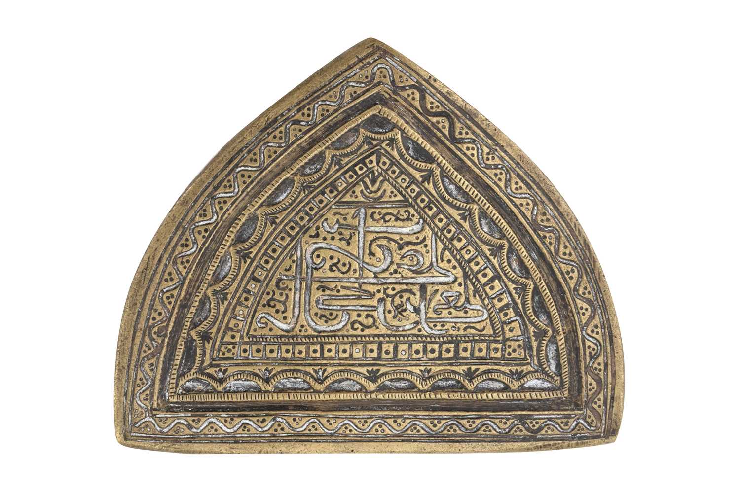 Lot 186 - AN ARCH-SHAPED BRASS MOULD OF SHI'A INTEREST