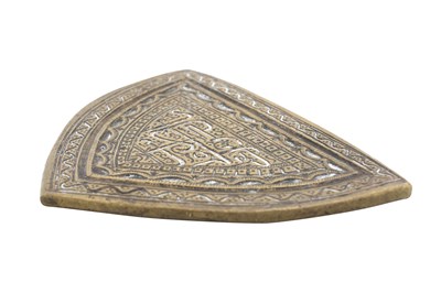 Lot 186 - AN ARCH-SHAPED BRASS MOULD OF SHI'A INTEREST