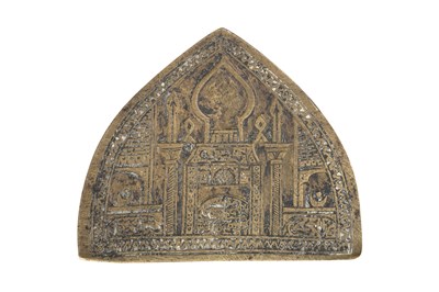 Lot 186 - AN ARCH-SHAPED BRASS MOULD OF SHI'A INTEREST