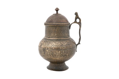 Lot 185 - A PERSIAN BRASS WINE JUG WITH LID