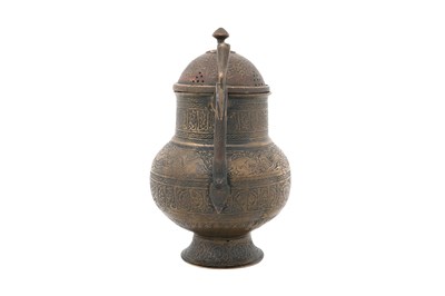 Lot 185 - A PERSIAN BRASS WINE JUG WITH LID