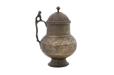 Lot 185 - A PERSIAN BRASS WINE JUG WITH LID