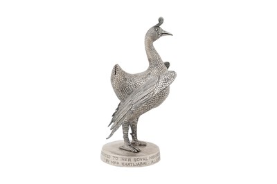 Lot 223 - A SILVER PEACOCK FIGURINE WITH A DEDICATION TO HER ROYAL HIGHNESS THE PRINCESS AGA KHAN