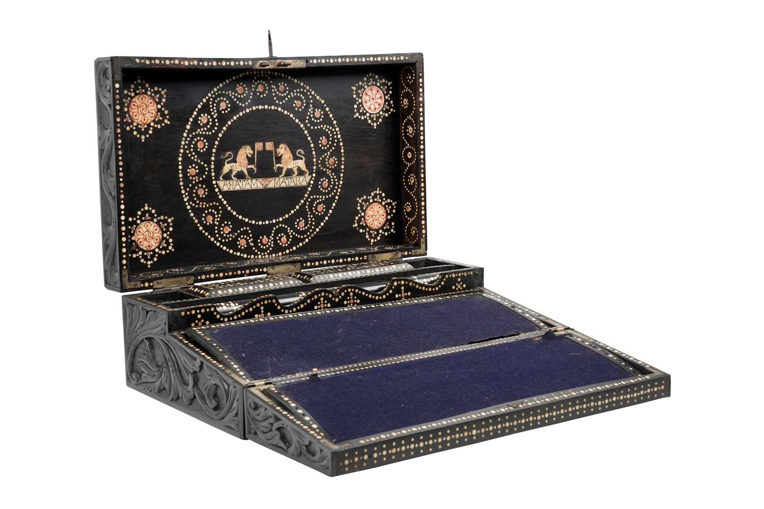 Lot 168 - λ A SINHALESE CARVED EBONY PORTABLE WRITING CABINET WITH IVORY-INLAID LIONS