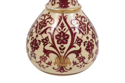 Lot 265 - AN OVERGLAZE PINK-ENAMELLED AND GILT IZNIK-STYLE POTTERY VASE
