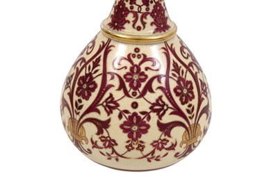 Lot 265 - AN OVERGLAZE PINK-ENAMELLED AND GILT IZNIK-STYLE POTTERY VASE