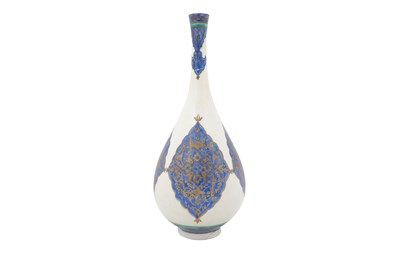 Lot 128 - AN ISLAMIC-REVIVAL KUTAHYA-STYLE GILT POTTERY VASE