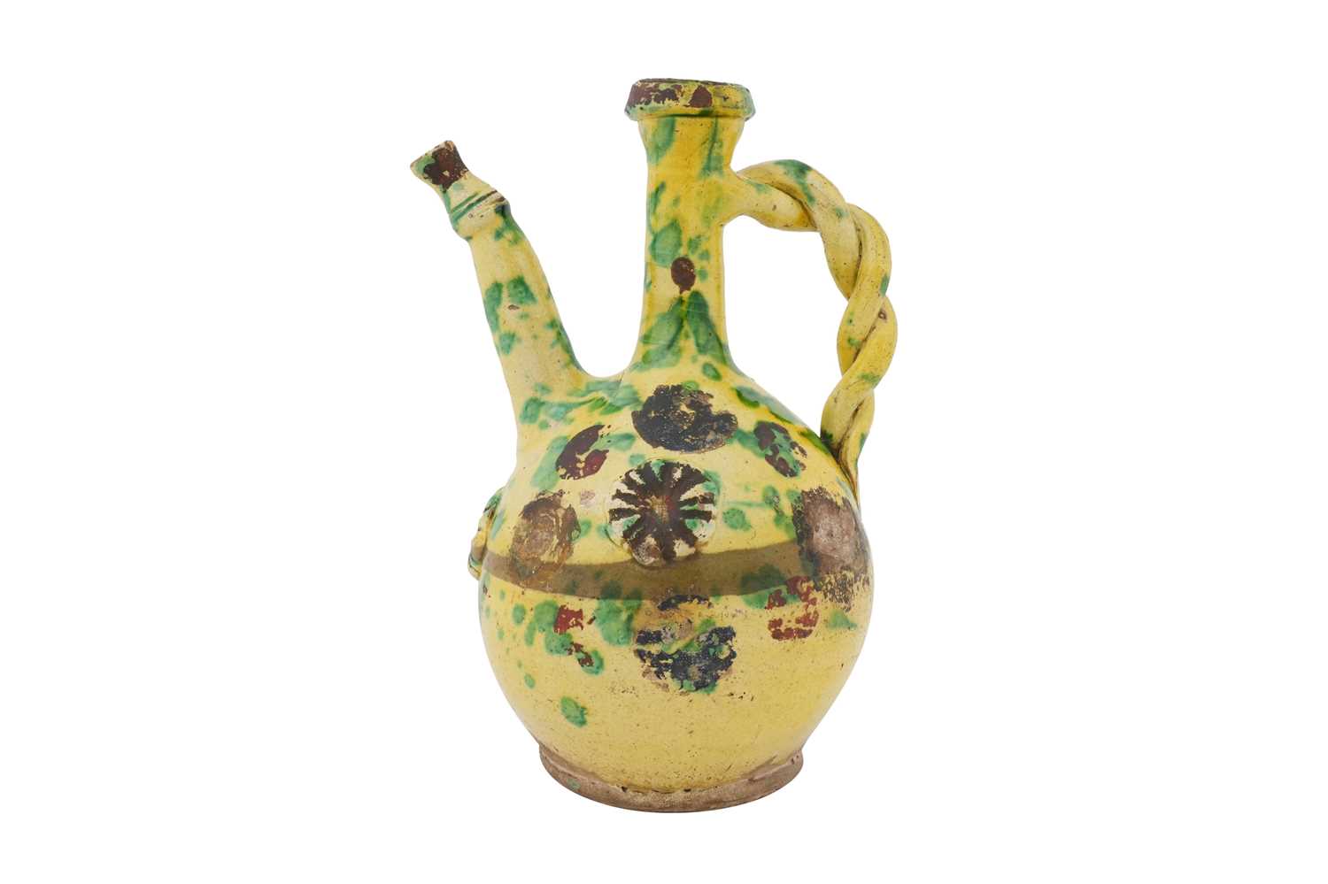 Lot 121 - A GOLD-ENAMELLED AND GREEN-SPLASHED YELLOW-GLAZED CANAKKALE POTTERY EWER