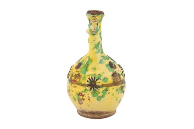 Lot 121 - A GOLD-ENAMELLED AND GREEN-SPLASHED YELLOW-GLAZED CANAKKALE POTTERY EWER