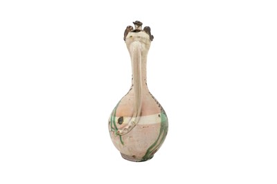 Lot 119 - A LARGE GOLD-ENAMELLED AND GREEN-SPLASHED WHITE-GLAZED CANAKKALE POTTERY EWER