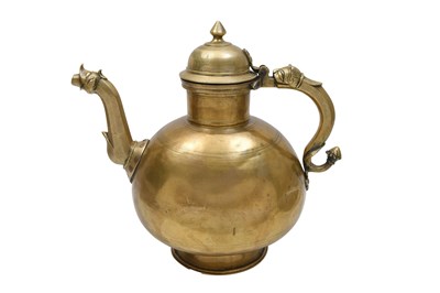 Lot 145 - A LARGE INDIAN BRASS EWER WITH DRAGON HANDLE AND MAKARA SPOUT
