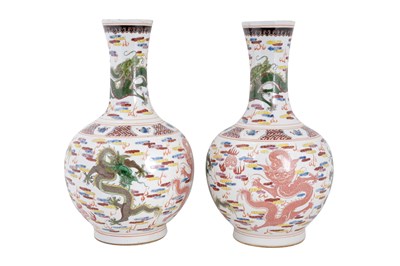 Lot 183 - A PAIR OF CHINESE FAMILLE ROSE 'DRAGON' BOTTLE VASES