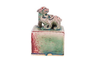 Lot 168 - A LARGE CHINESE PEACH-BLOOM GLAZED CERAMIC SEAL