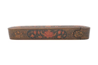 Lot 107 - A QAJAR LACQUERED PAPIER-MÂCHÉ PEN CASE (QALAMDAN) WITH GOL O BOLBOL MOTIF