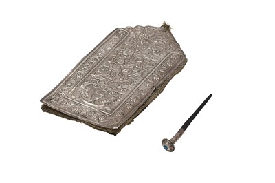 Lot 223 - A COSMETIC TRAVEL POUCH WITH APPLICATOR