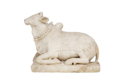Lot 228 - A CARVED MARBLE SCULPTURE OF NANDI THE BULL