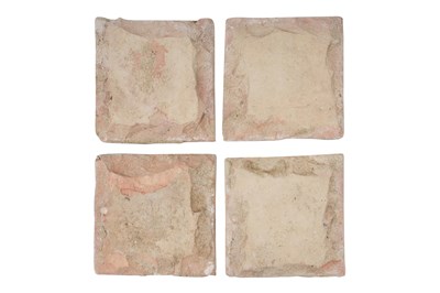 Lot 146 - FOUR TUNISIAN POLYCHROME-PAINTED CUERDA SECA POTTERY TILES