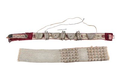 Lot 216 - TWO ARABIAN BELTS WITH SILVER AND WHITE METAL ACCESSORIES