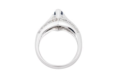 Lot 20 - A 18K WHITE GOLD MARQUISE-CUT SAPPHIRE AND DIAMOND COCKTAIL RING.