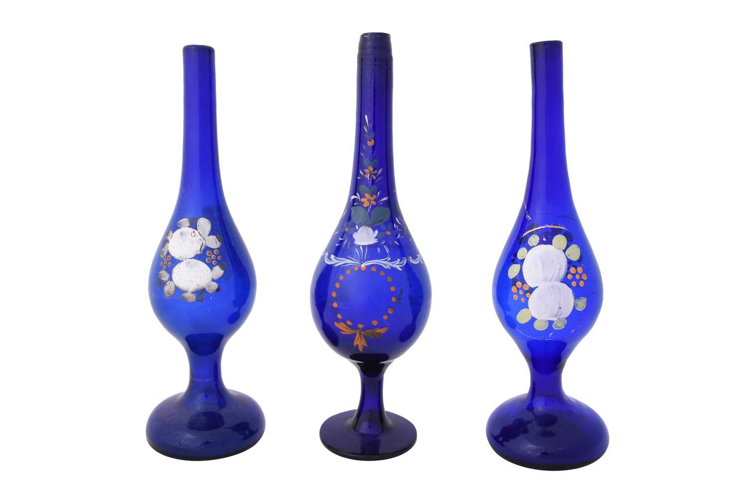 Lot 128 - THREE POLYCHROME-PAINTED CLEAR BLUE BEYKOZ GLASS ROSEWATER SPRINKLERS