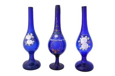 Lot 128a - THREE POLYCHROME-PAINTED CLEAR BLUE BEYKOZ GLASS ROSEWATER SPRINKLERS