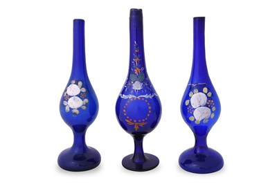 Lot 128 - THREE POLYCHROME-PAINTED CLEAR BLUE BEYKOZ GLASS ROSEWATER SPRINKLERS