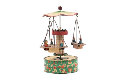 Lot 129 - BLOMER AND SCHULER TIN WIND-UP CAROUSEL
