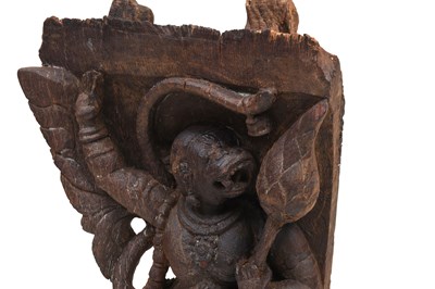 Lot 26 - A CARVED HARDWOOD ARCHITECTURAL PANEL WITH THE HINDU MONKEY GOD, HANUMAN
