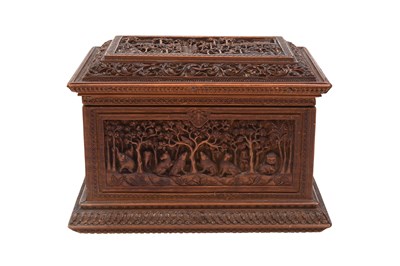Lot 121 - A FINELY CARVED SANDALWOOD JEWELLERY CASKET WITH WILD ANIMALS AND A VILLAGE SCENE