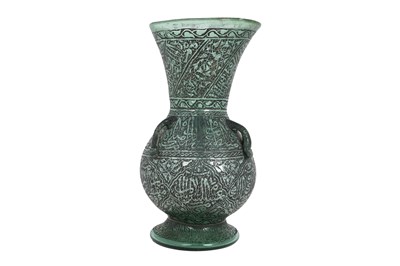Lot 227 - A MAMLUK-REVIVAL ENAMELLED GREEN GLASS MOSQUE LAMP
