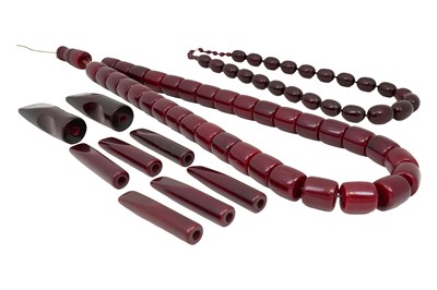 Lot 24 - A LARGE QUANTITY OF CHERRY AMBER-STYLE BAKELITE PIECES