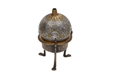 Lot 240 - A SILVER-INLAID OPENWORK MAMLUK-REVIVAL BRASS INCENSE BURNER