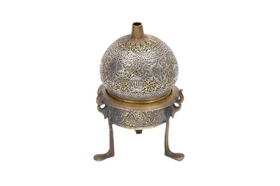 Lot 240 - A SILVER-INLAID OPENWORK MAMLUK-REVIVAL BRASS INCENSE BURNER