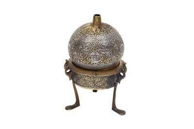 Lot 240 - A SILVER-INLAID OPENWORK MAMLUK-REVIVAL BRASS INCENSE BURNER