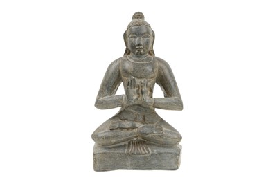 Lot 77 - A SOUTHEAST ASIAN STONE FIGURE OF A BUDDHA
