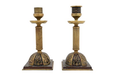 Lot 112 - λ A PAIR OF BRASS TORTOISE SHELL INLAID BOULLE CANDLESTICKS