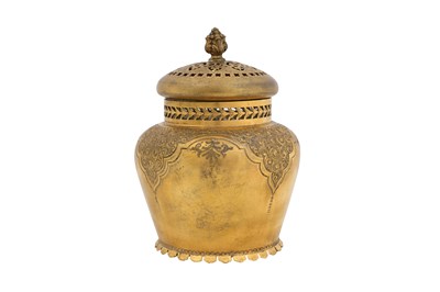 Lot 11 - A YELLOW METAL MARTIN HALL & CO LIDDED JAR