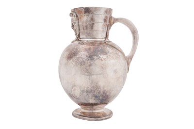 Lot 3 - A SILVER-PLATED JUG WITH A MONOGRAM