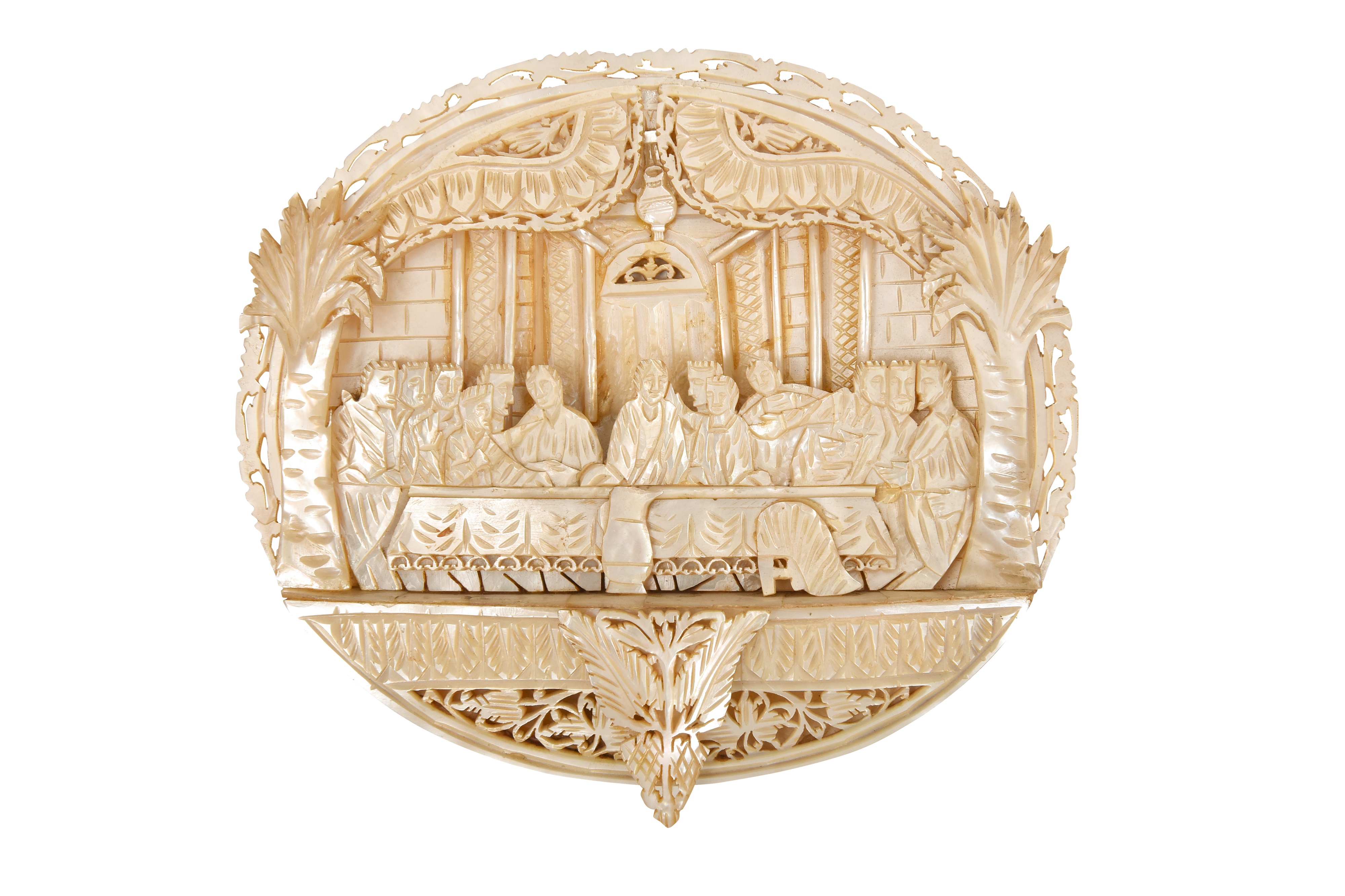 Lot 237 - λ A CARVED MOTHER-OF-PEARL SHELL PLAQUE WITH
