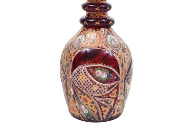 Lot 267 - AN INTACT RED AND GILT BOHEMIAN URANIUM CUT-GLASS SPIRIT DECANTER FOR THE IRANIAN EXPORT MARKET