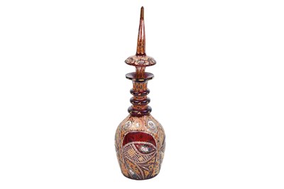 Lot 267 - AN INTACT RED AND GILT BOHEMIAN URANIUM CUT-GLASS SPIRIT DECANTER FOR THE IRANIAN EXPORT MARKET