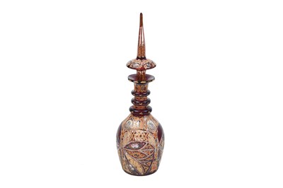 Lot 267 - AN INTACT RED AND GILT BOHEMIAN URANIUM CUT-GLASS SPIRIT DECANTER FOR THE IRANIAN EXPORT MARKET