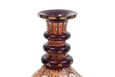 Lot 267 - AN INTACT RED AND GILT BOHEMIAN URANIUM CUT-GLASS SPIRIT DECANTER FOR THE IRANIAN EXPORT MARKET