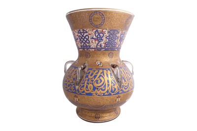 Lot 228 - A MAMLUK-REVIVAL ENAMELED GLASS MOSQUE LAMP