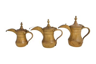 Lot 92 - THREE BRASS COFFEE POTS (DALLAH)