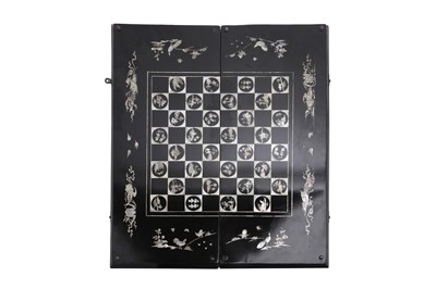 Lot 70 - A CHINESE BLACK LACQUER AND MOTHER-OF-PEARL CHESS AND BACKGAMMON BOARD