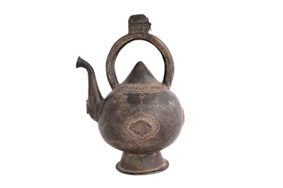 Lot 47 - A FINE SAFAVID BRONZE FOOTED POURING VESSEL OR KETTLE EWER