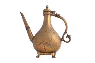 Lot 76 - A LARGE MUGHAL INDIAN BRONZE EWER WITH ZOOMORPHIC HANDLE