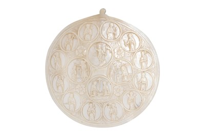Lot 208 - A MOTHER-OF-PEARL SHELL CARVING DEPICTING BIBLICAL SCENES
