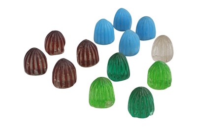 Lot 222 - A SET OF FOURTEEN COLOURED GLASS SET FROM A CHAUPAR OR PACHISI GAME SET PIECES